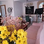 Coty's Beach, En Casa Compartida בית אירוח