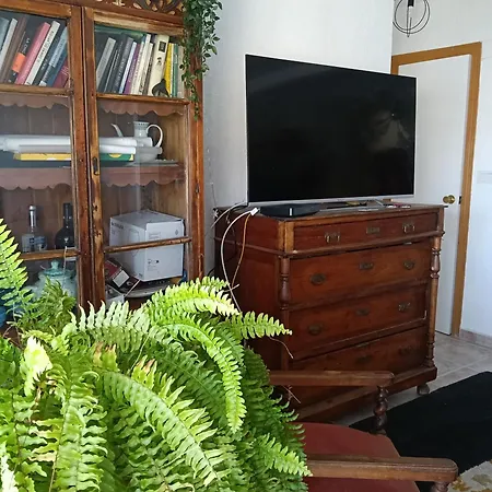 Coty's Beach, En Casa Compartida Homestay
